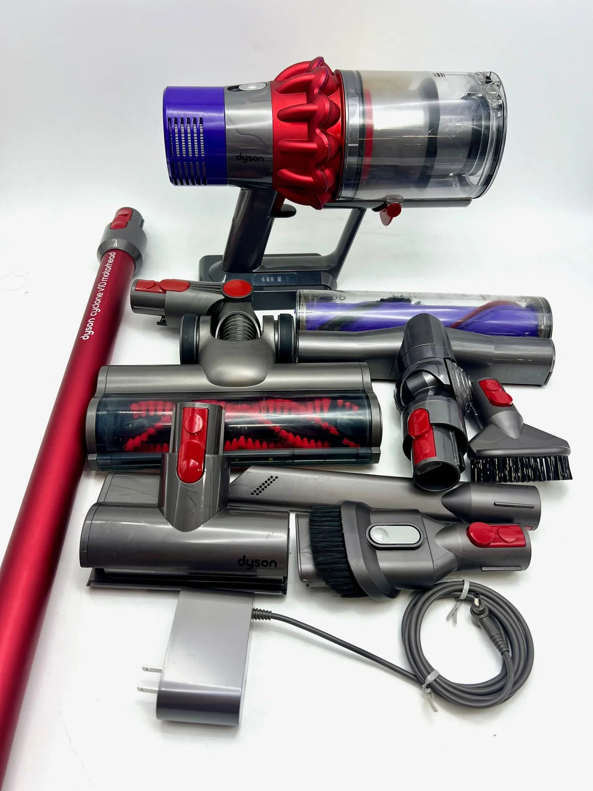 Pre-Owned Dyson Cyclone V10 Motorhead Cordless Sizetick Vacuum 244393-01 - PURPLE/RED (Fair)